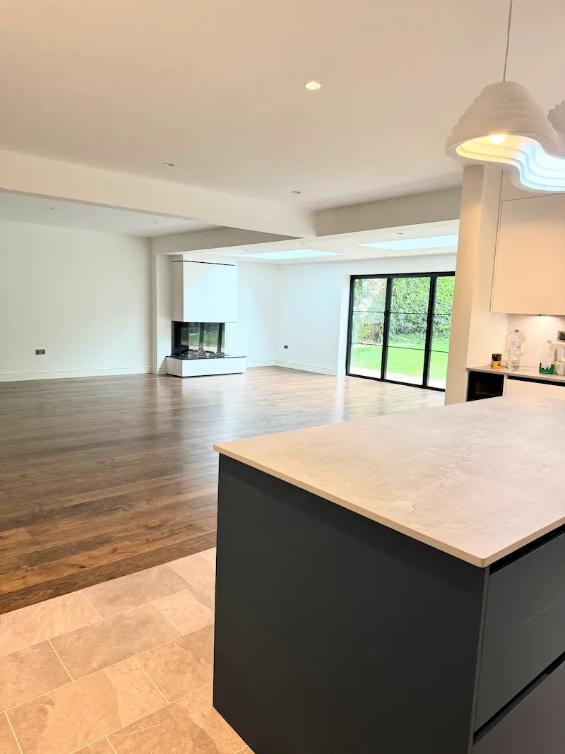Modern open-plan kitchen and living area with contemporary design